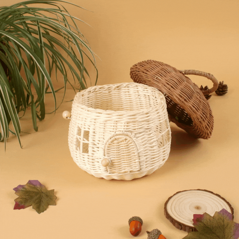 A gif of a mushroom shaped basket spinning round with its door opening