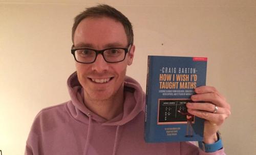 image of Mr Barton holding his own book image of Mr Barton holding his own book