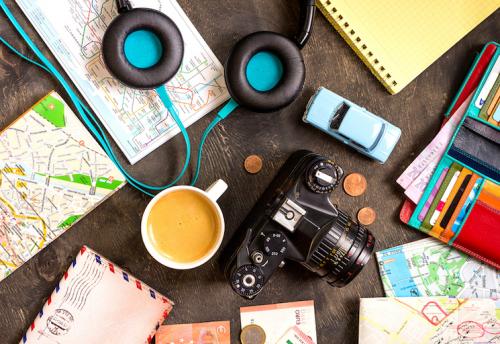 Holiday planning items scattered on a desk