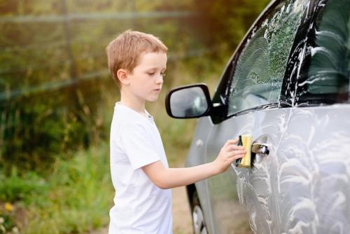 boy washing car