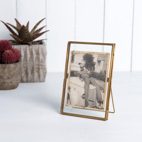 Standing brass frame