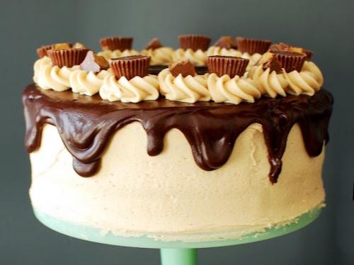 Topped with peanut butter cups! Mmm... Katie's chocolate peanut butter cake