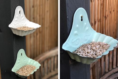 three pastel enamel bird feeders