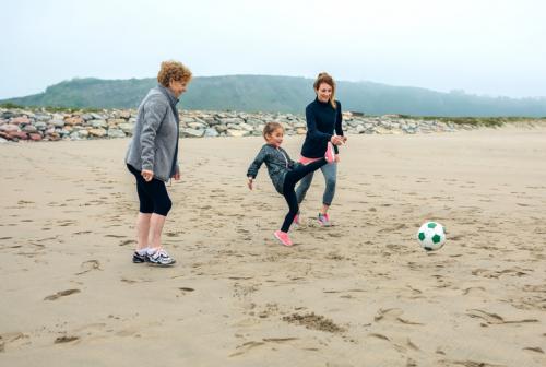 3 generations of women playing football