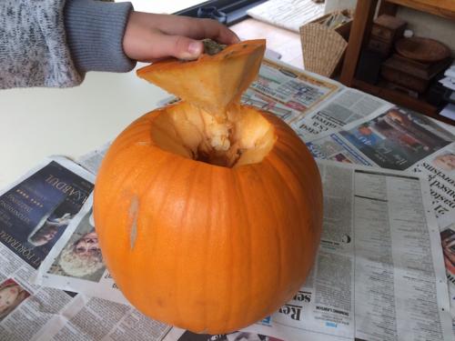 Cut a hole in the top of your pumpkin at an angle