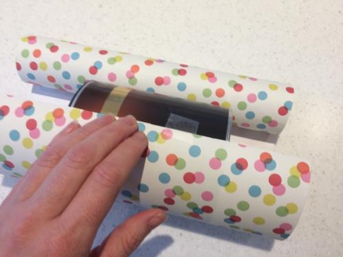 step 2 wrapping cylindrical gifts