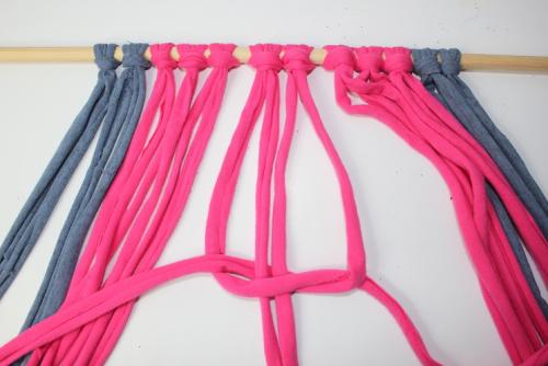 tying a square knot for a macrame decoration