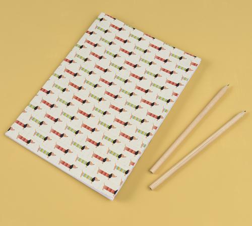 Notebook covered in Sausage Dog washi tape