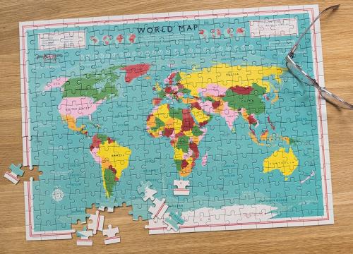 World Map puzzle in a tube