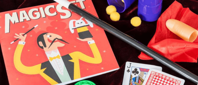 Magic wand and cards in magic set