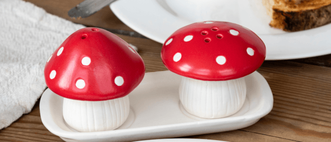red and white mushroom salt and pepper shakers