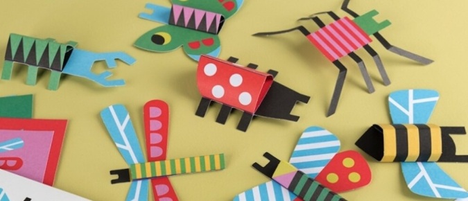 DIY cardboard bug craft set, with colourful paper creations including a bee, dragonfly, ladybird and beetle.