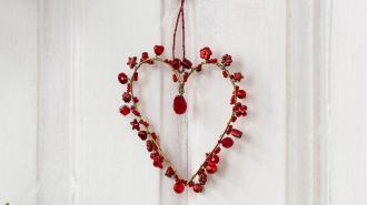 Red heart decoration on door