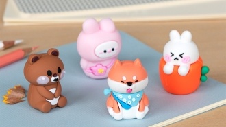 Four animal-themed pencil sharpeners—a brown bear, pink bunny, dog and rabbit