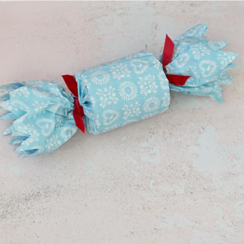 Gift wrap a cracker shape