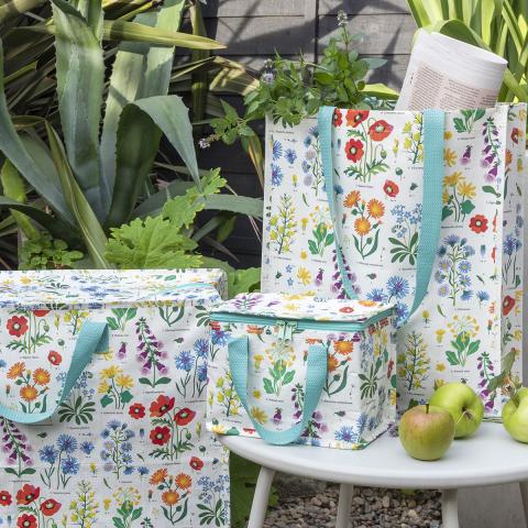 Jumbo storage bag, shopping bag and lunch bag in a Wild Flowers design, with a foliage background