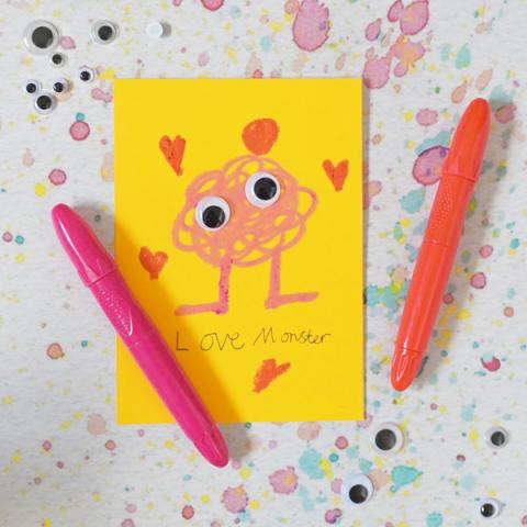 A card with a Love Monster drawn on, with stick on googly eyes
