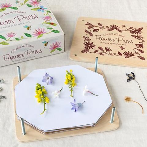 Wooden flower press with flowers