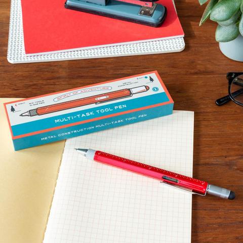 Multi task tool pen on a desk