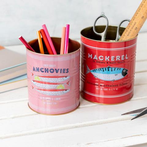 Pink and red Fish design storage tins, filled with stationery