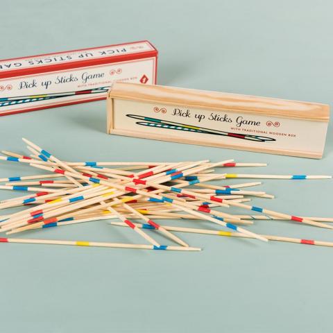 Wooden pick up sticks on a blue background