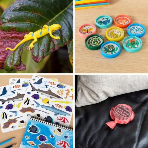 Party bag fillers including a stretchy gecko, tilt puzzles, ocean stickers and mini whoopee cushion