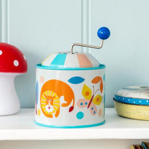 Winding tin music box