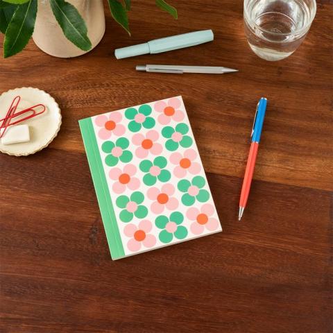 Pink daisy notebook with pen