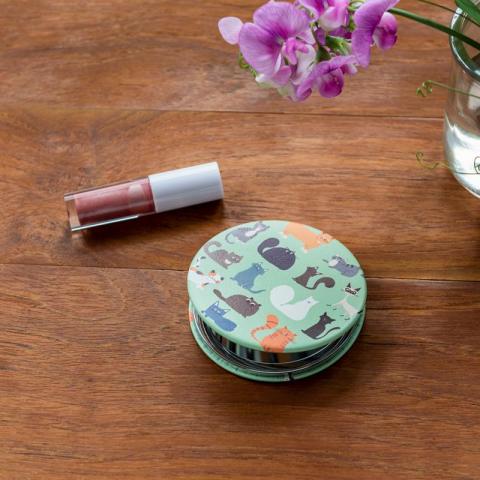Pocket mirror with lipstick