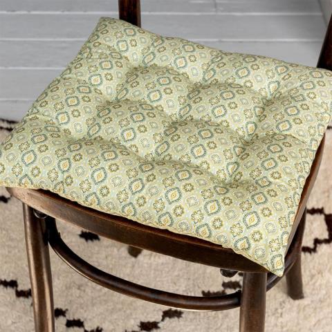 Green cushion on chair