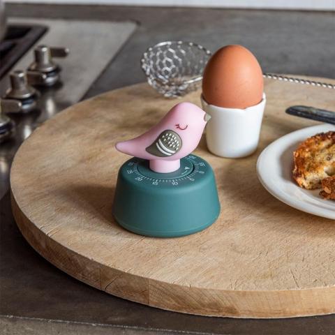 Bird shaped timer next to egg 