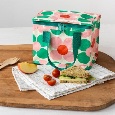 Pink and green daisy lunch bag with sandwiches