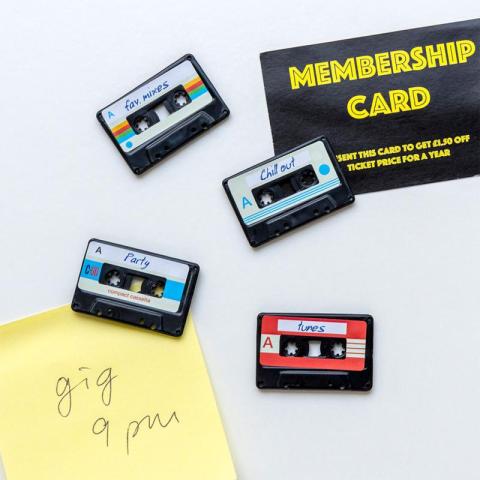 Four mini magnets shaped like cassette tapes
