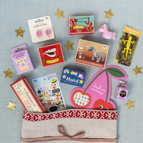 Stocking fillers coming out of stocking on blue background