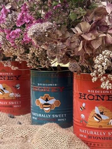 Flowers in retro storage tins