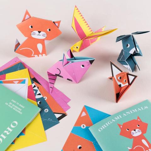 5 paper animals with the packaging next to them