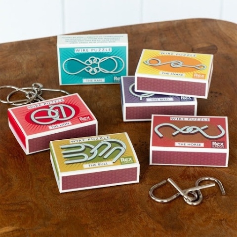 Assortment of wire brain teaser puzzles