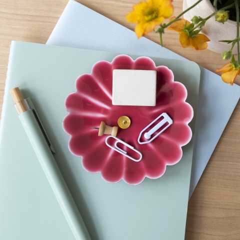 red trinket dish with stationery