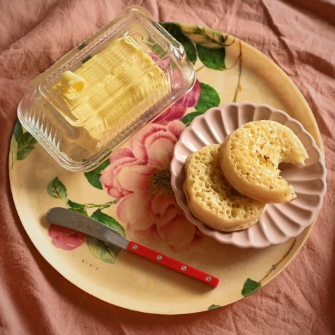 Retro glass butter dish and crumpets