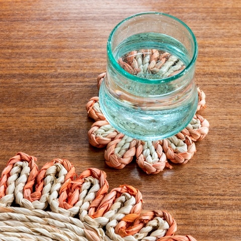 Orange corn husk coaster