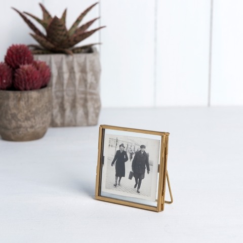 Standing brass frame