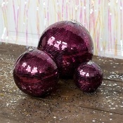 Gorgeous plum purple coloured disco ball decoration that brings some shine and sparkle to any party venue. 