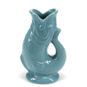 Glossy ceramic vase shaped like a stylised fish in blue glaze.