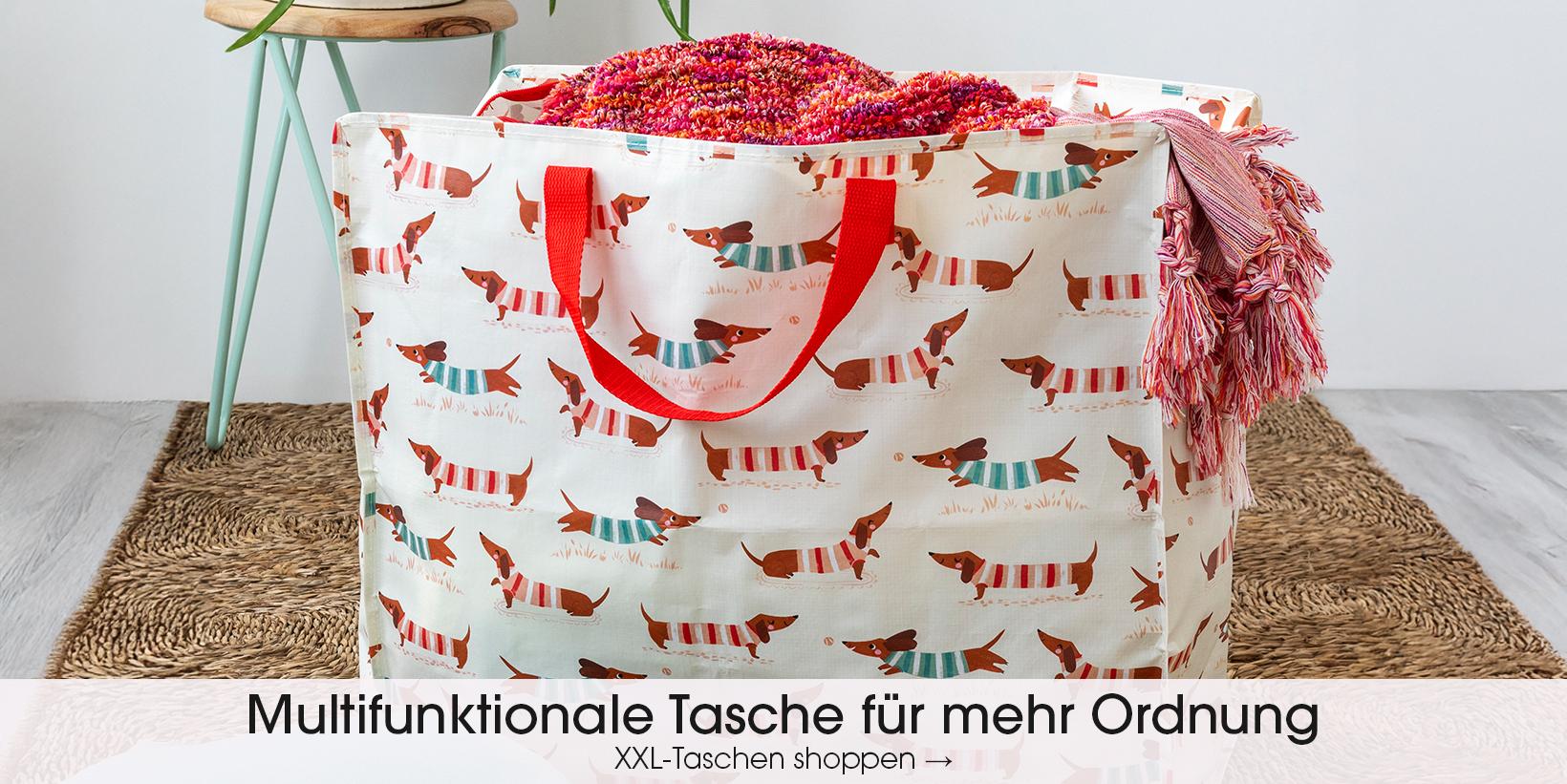 Adorable Sausage Dog print jumbo bag, Features zip fastening and two strong woven nylon handles in red.