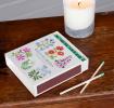 long matches in the box with wild flowers design