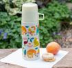 Small white stainless steel flask with cream plastic cup featuring colourful illustrations of wild animals
