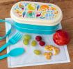 Turquoise plastic bento box with cream lid and middle tray featuring colourful illustrations of wild animals