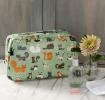 Light green oilcloth wash bag with illustrations of cats