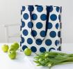 Recycled plastic shopping bag navy blue circles cream background