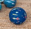 Navy blue inflatable play ball with space themed print
